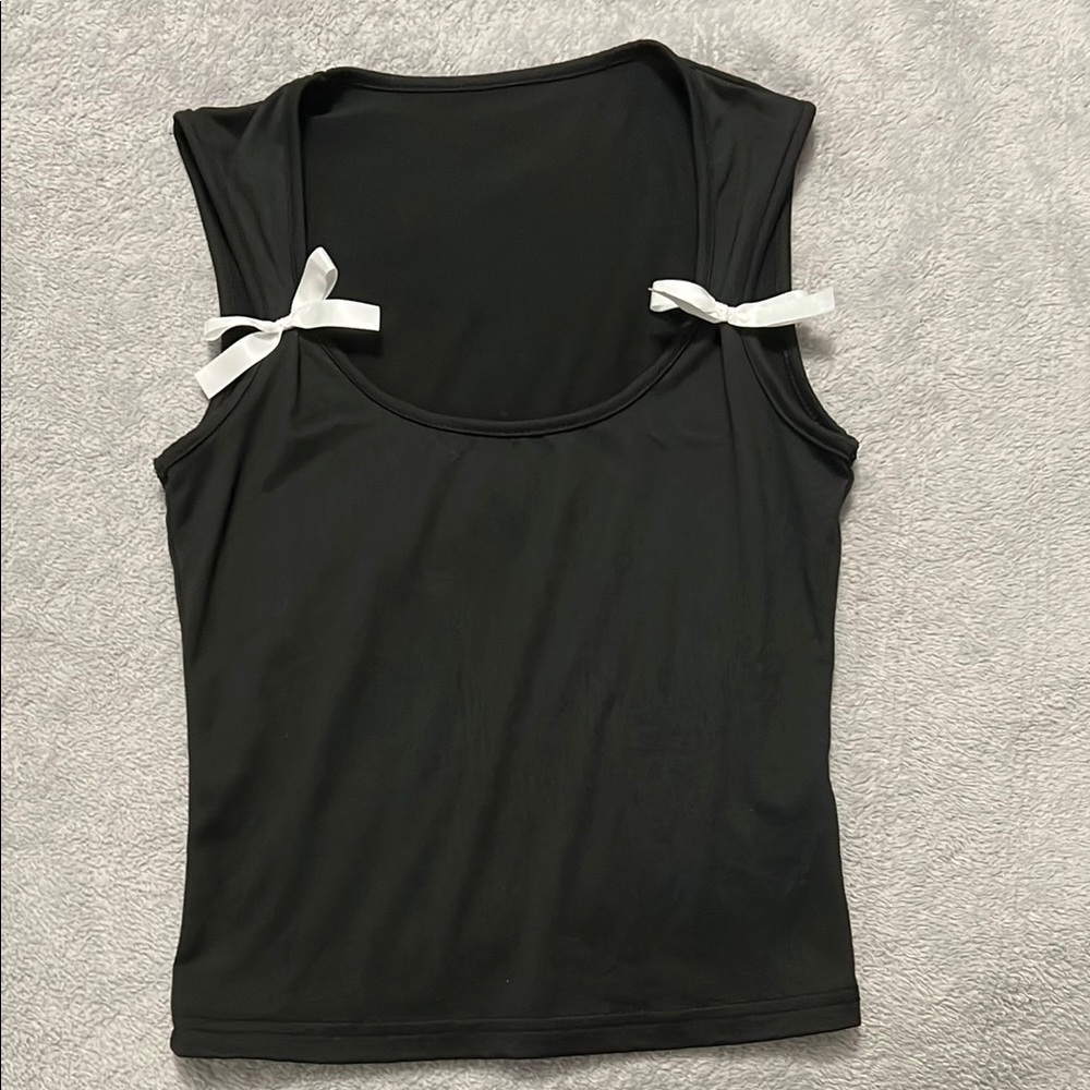 Black stretchy bodycon top with white bows